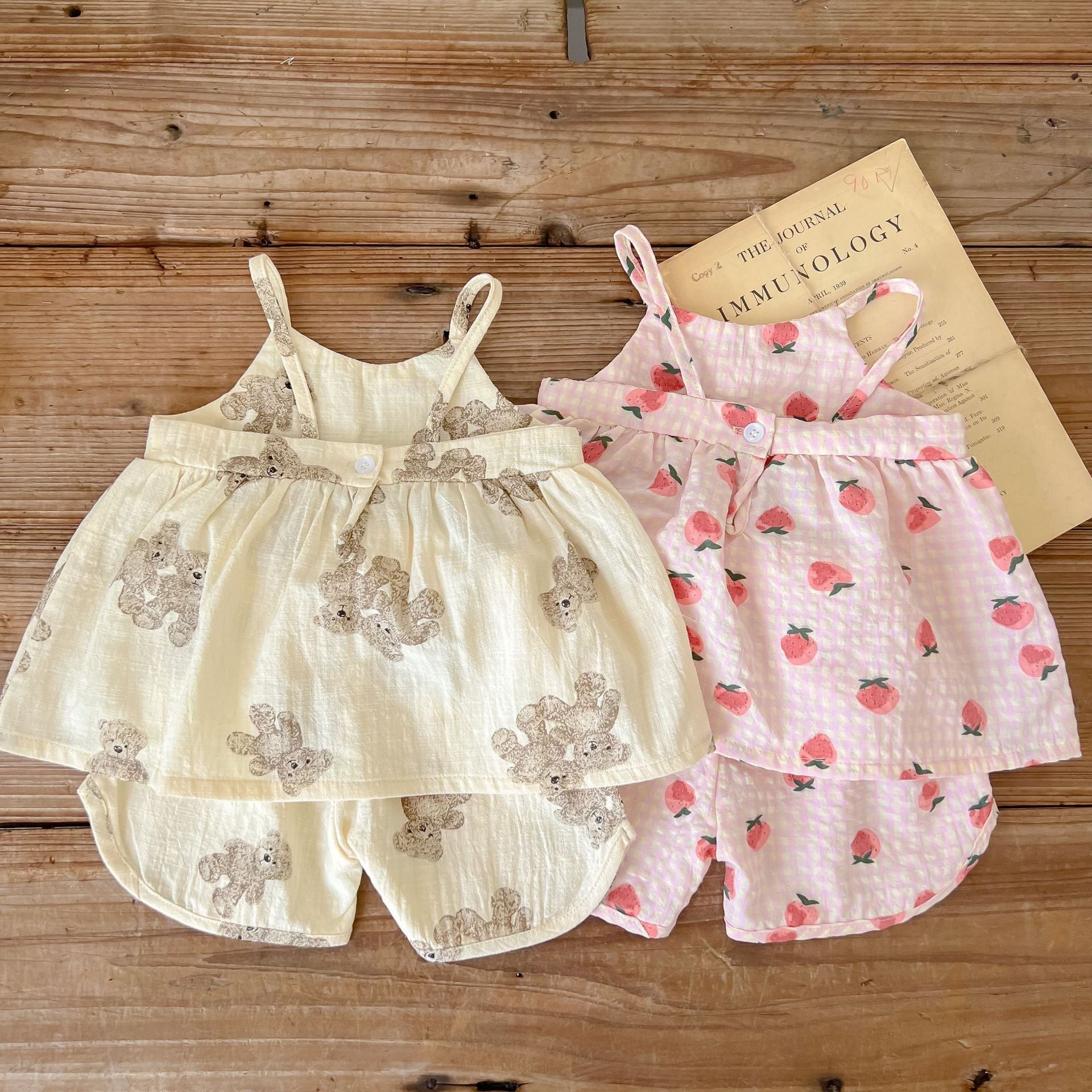 Baby animal print sling top and shorts set in pink and beige, featuring a stylish design for summer wear.