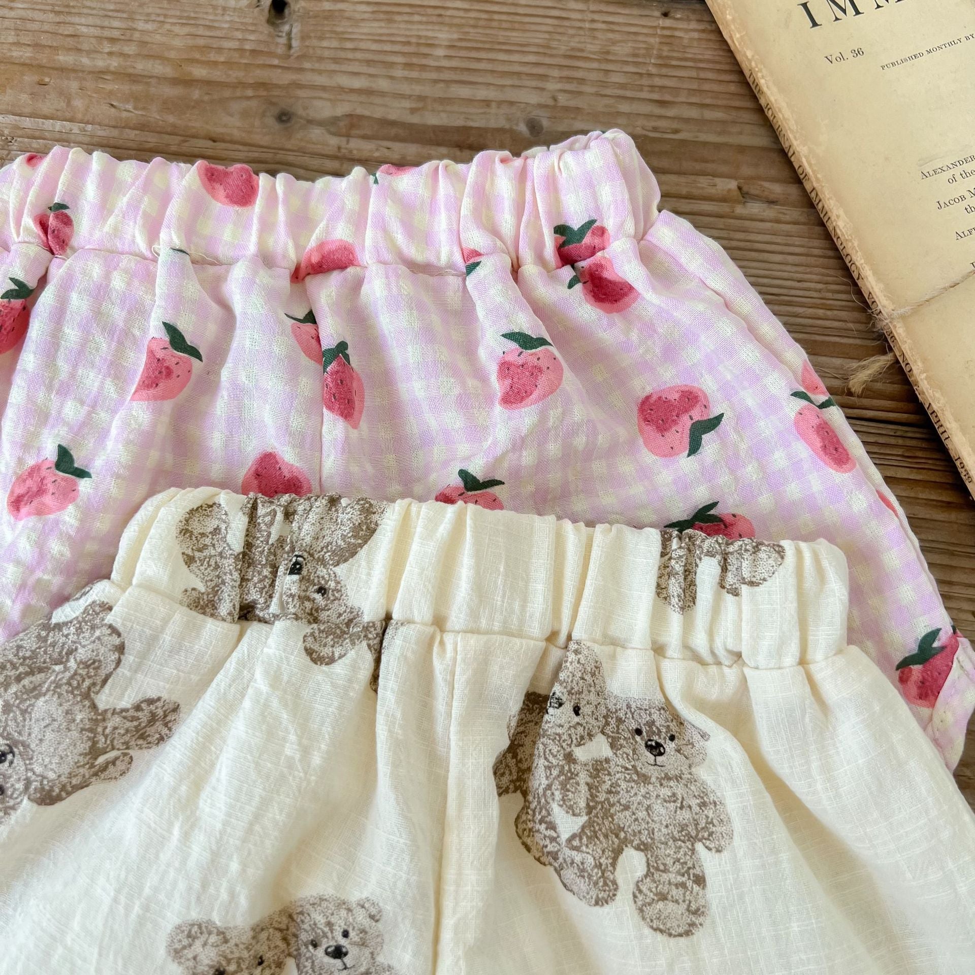 Baby animal print sling top and shorts set in pink and beige, featuring a stylish design for summer wear.