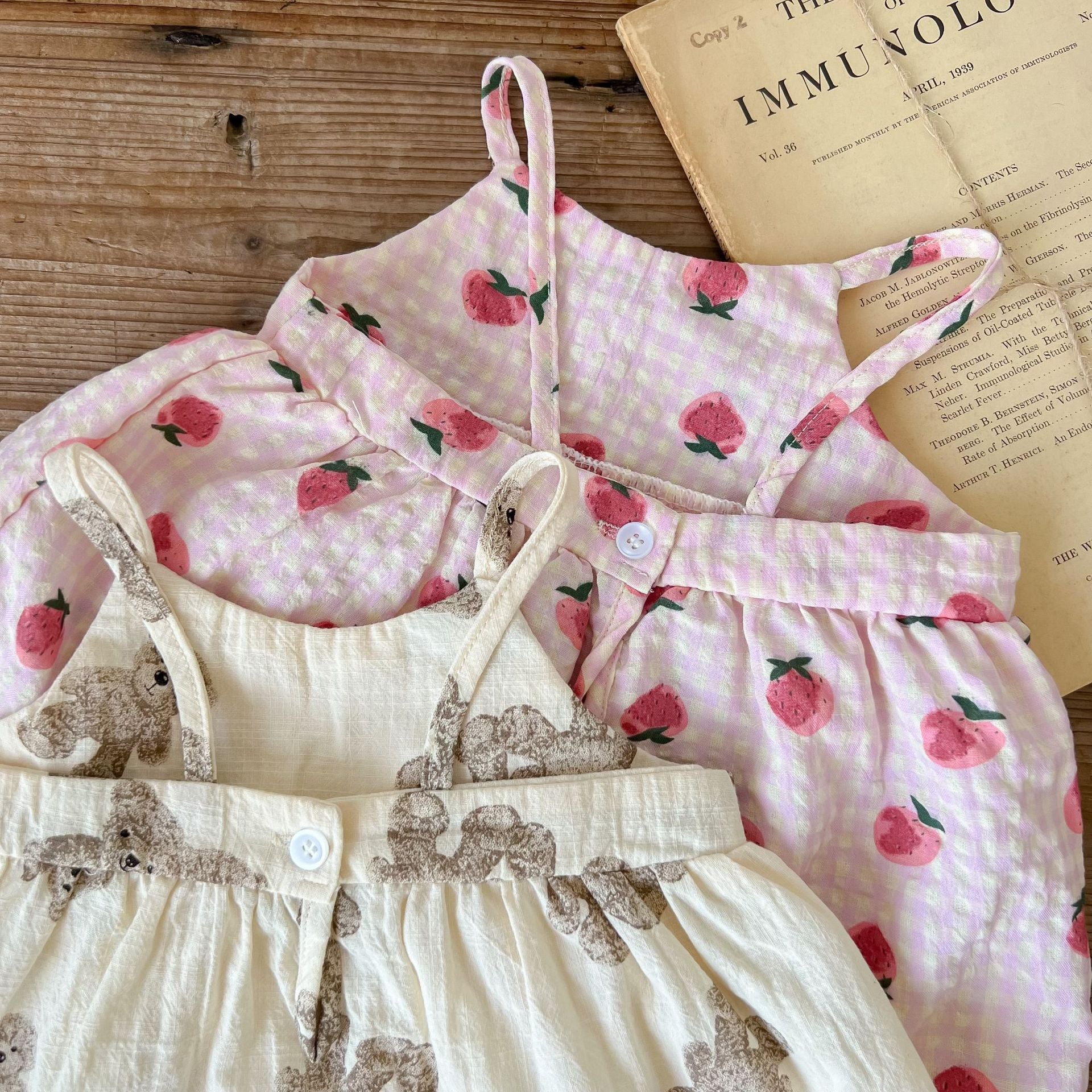 Baby animal print sling top and shorts set in pink and beige, featuring a stylish design for summer wear.