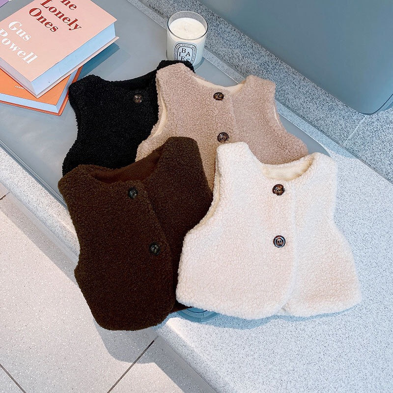 A cozy Baby Berber Fleece Design Button Front Warm Coat Vest in black, showcasing its soft fleece material and button front design.