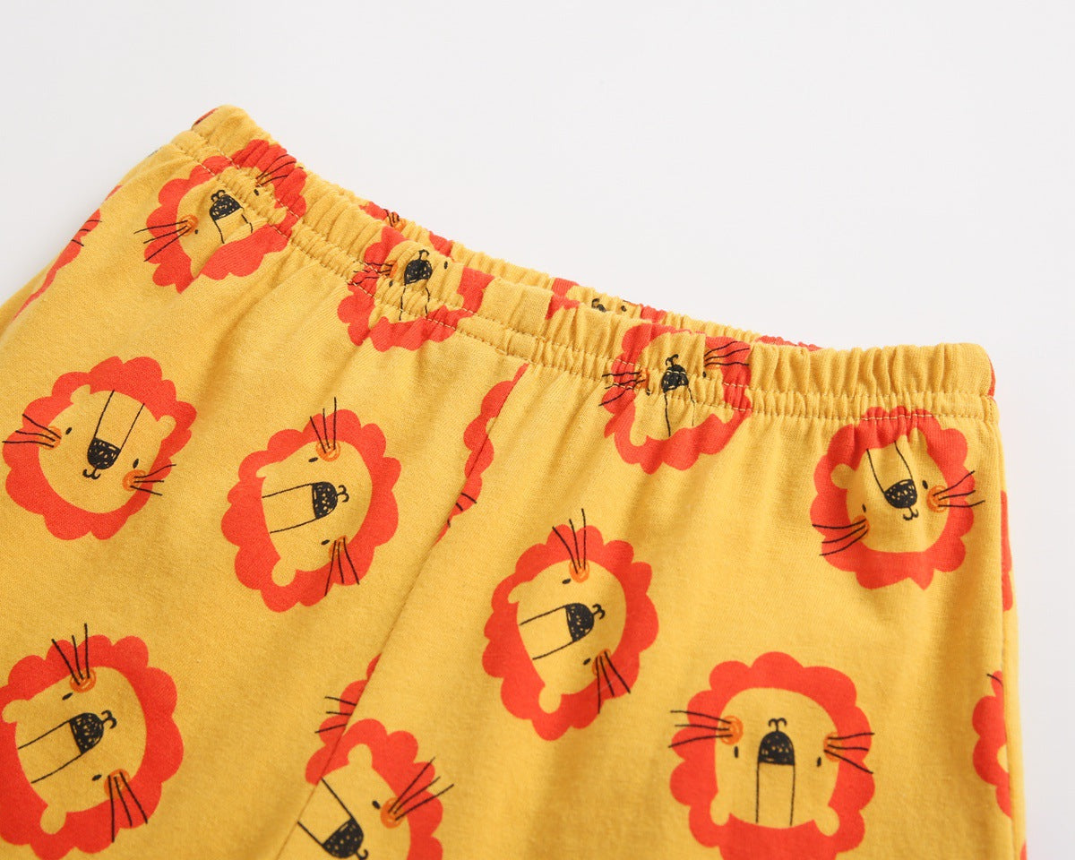 Baby boy and girl sleeveless top combo shorts set featuring a vibrant tiger print design in yellow, perfect for summer wear.