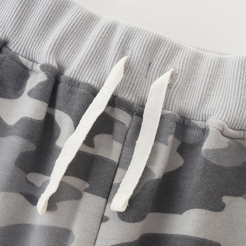 Baby boy camouflage pattern loose casual pants in black, green, and grey colors, made from soft cotton for comfort.