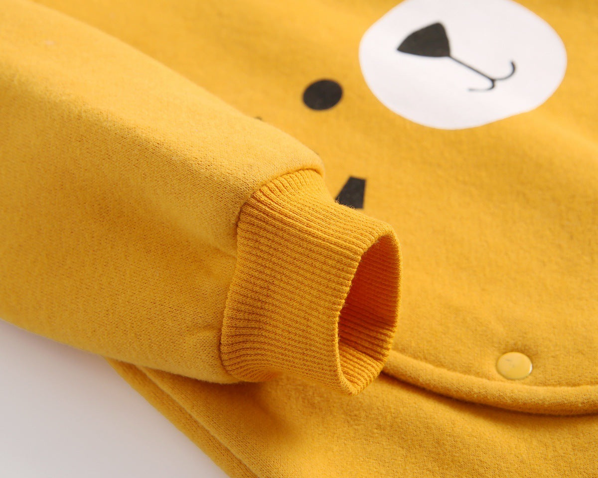 Baby boy wearing a vibrant cartoon pattern longsleeve romper with side buttons and a matching hat, showcasing a cheerful yellow color.