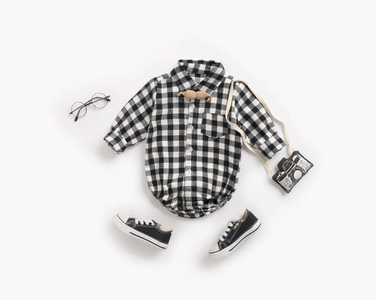 Baby boy wearing a plaid pattern buttoned shirt onesie with pockets, showcasing a stylish and comfortable design.