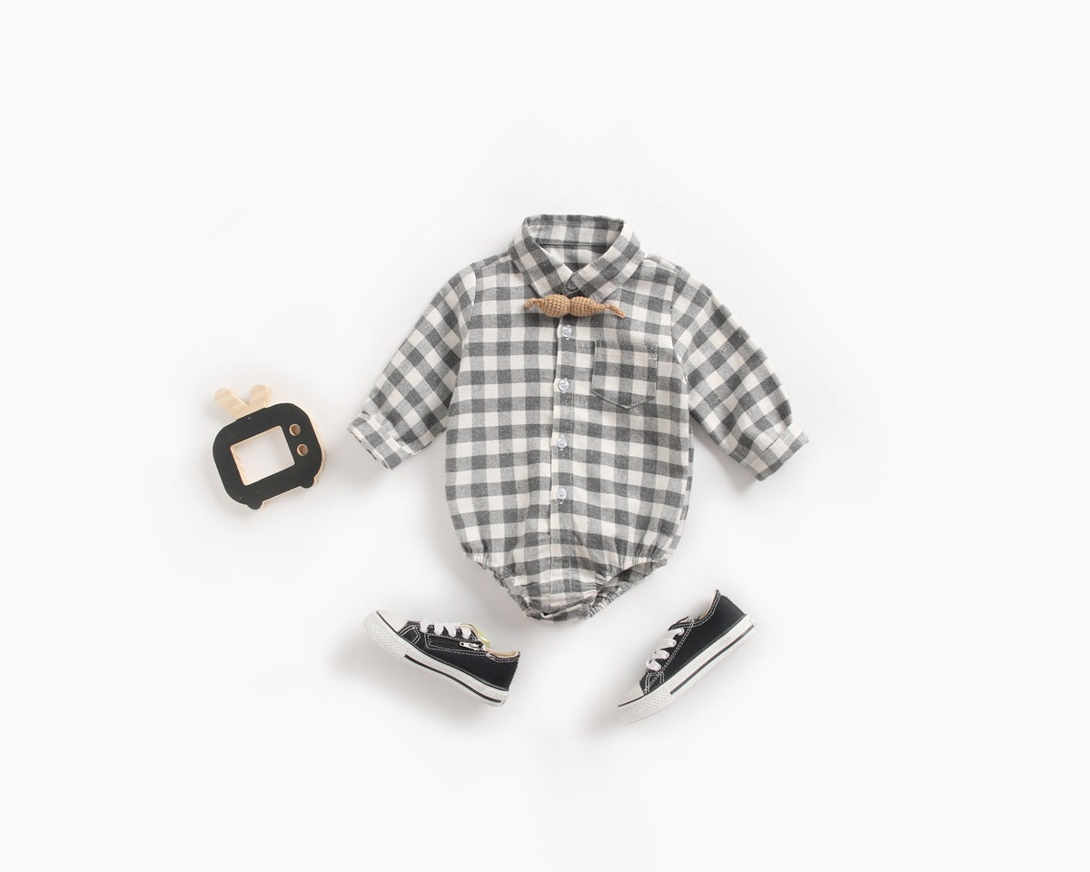 Baby boy wearing a plaid pattern buttoned shirt onesie with pockets, showcasing a stylish and comfortable design.