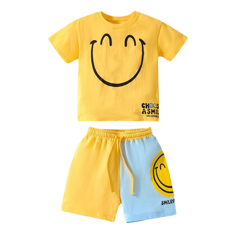 Baby boy clothing set featuring a bright yellow smile print pattern, made from soft cotton, perfect for summer wear.