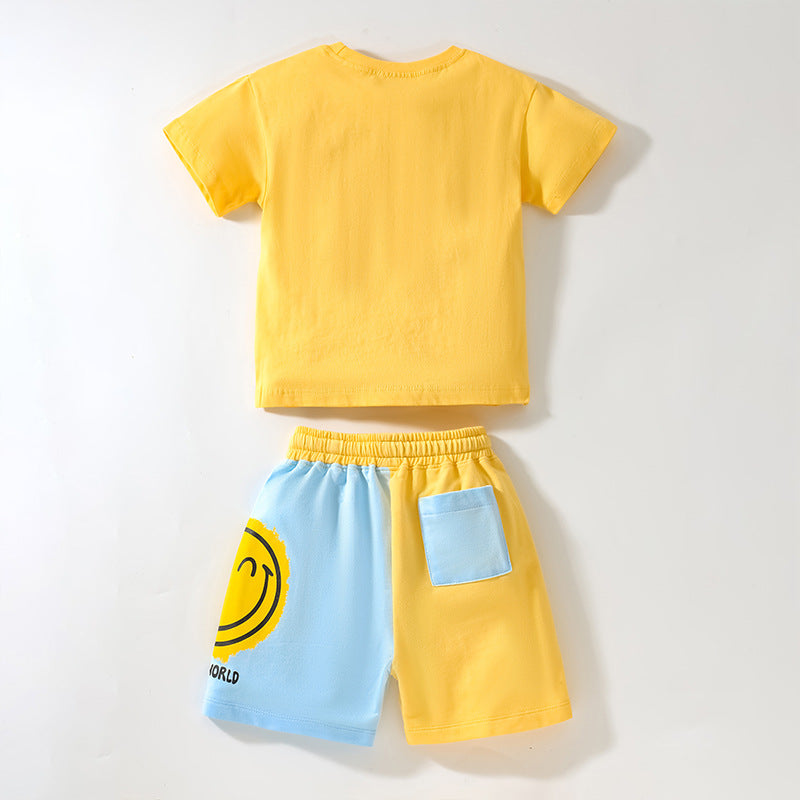 Baby boy clothing set featuring a bright yellow smile print pattern, made from soft cotton, perfect for summer wear.