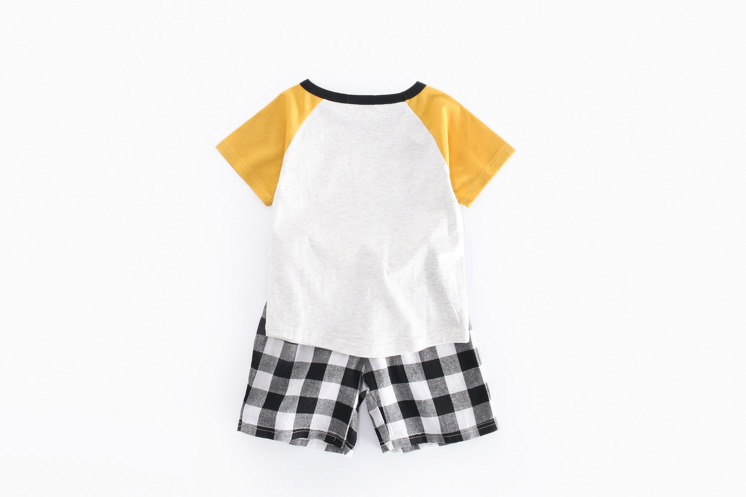 A vibrant yellow short-sleeved top with a bear print, paired with plaid shorts, perfect for baby boys.