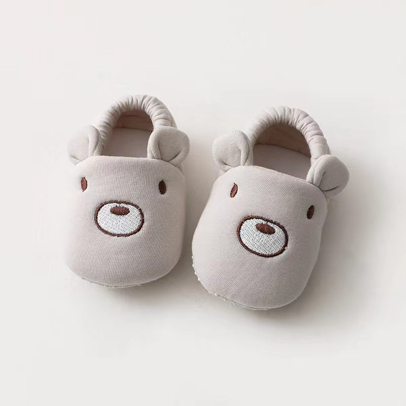 Baby Cartoon Animal Embroidered Toddle Shoes in various colors with soft cotton filling, featuring playful animal graphics.