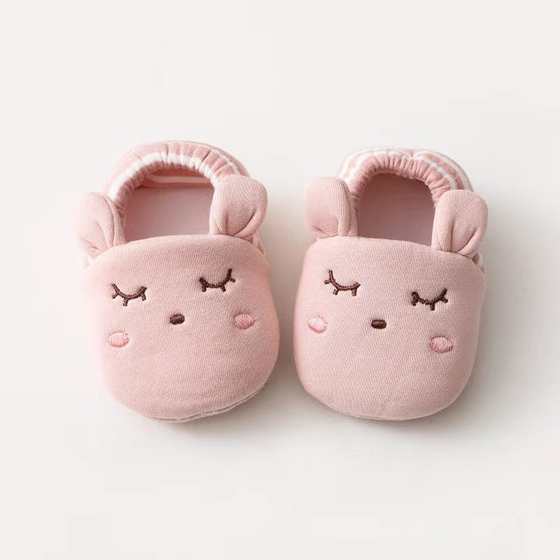 Baby Cartoon Animal Embroidered Toddle Shoes in various colors with soft cotton filling, featuring playful animal graphics.