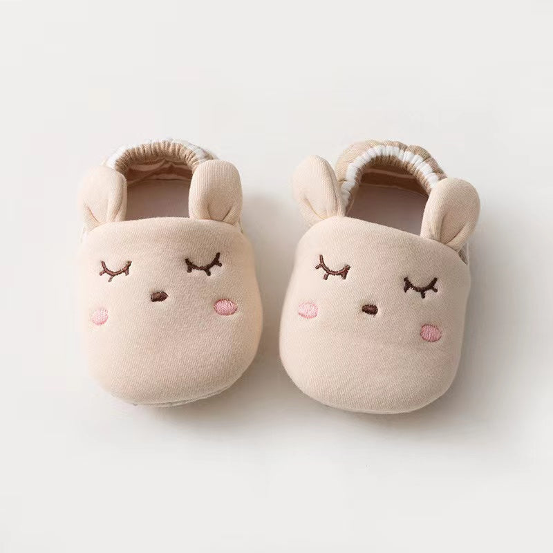 Baby Cartoon Animal Embroidered Toddle Shoes in various colors with soft cotton filling, featuring playful animal graphics.