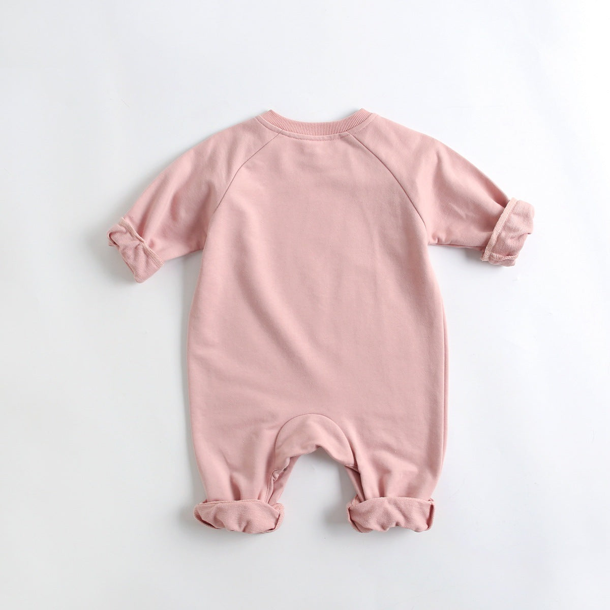 A soft cotton baby romper featuring a cute cartoon animal pattern, designed for comfort with long sleeves and footed legs.