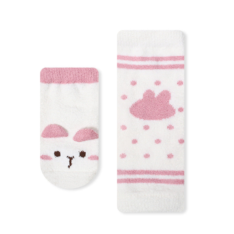 A pair of warm long socks for babies featuring a colorful cartoon animal print pattern, designed for comfort and safety.