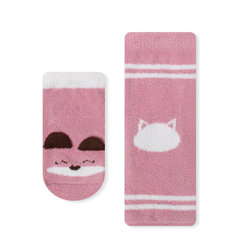 A pair of warm long socks for babies featuring a colorful cartoon animal print pattern, designed for comfort and safety.