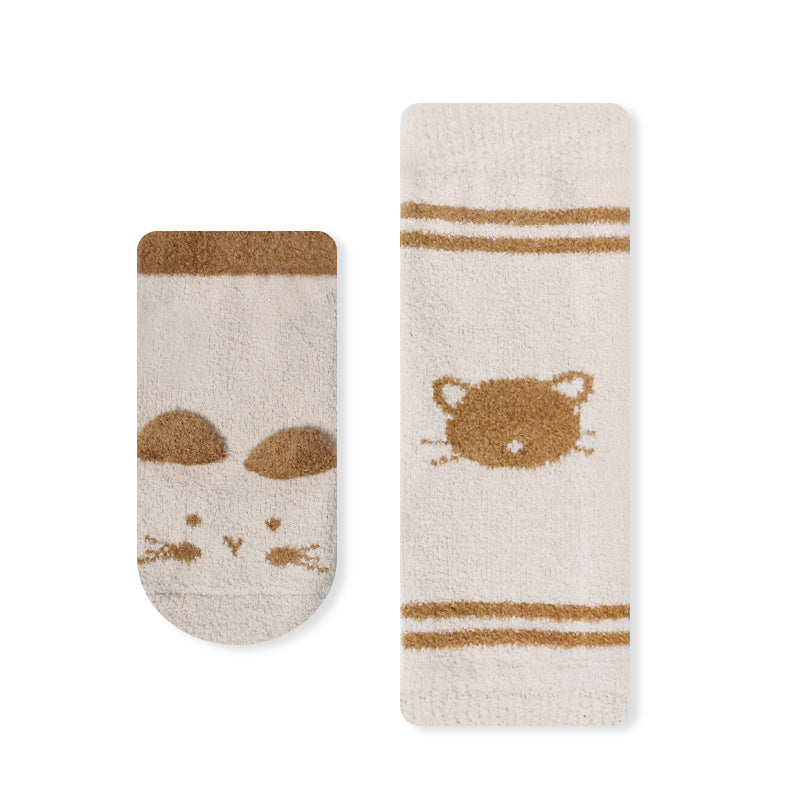 A pair of warm long socks for babies featuring a colorful cartoon animal print pattern, designed for comfort and safety.