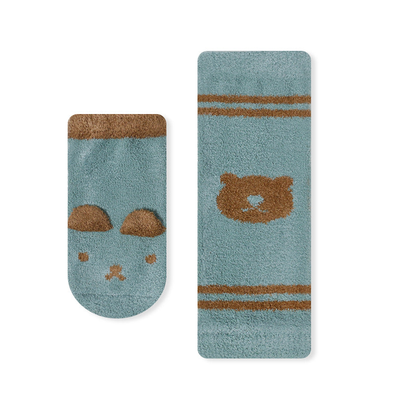 A pair of warm long socks for babies featuring a colorful cartoon animal print pattern, designed for comfort and safety.