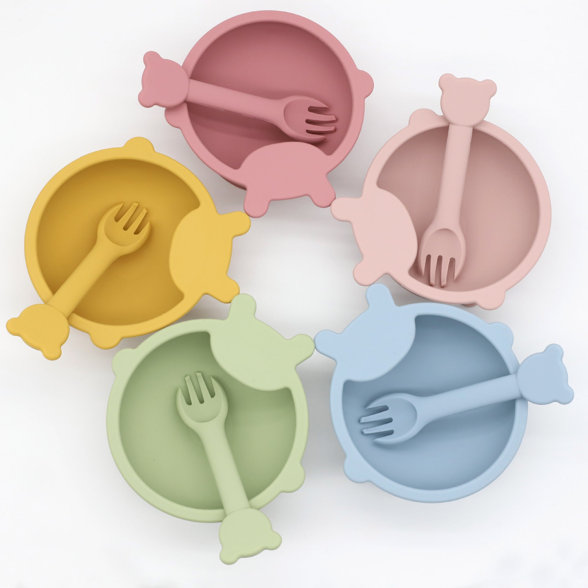 Baby Cartoon Bear Shape Silicone Bowl with Spoon Set in various colors, designed for toddlers to enjoy mealtime safely.