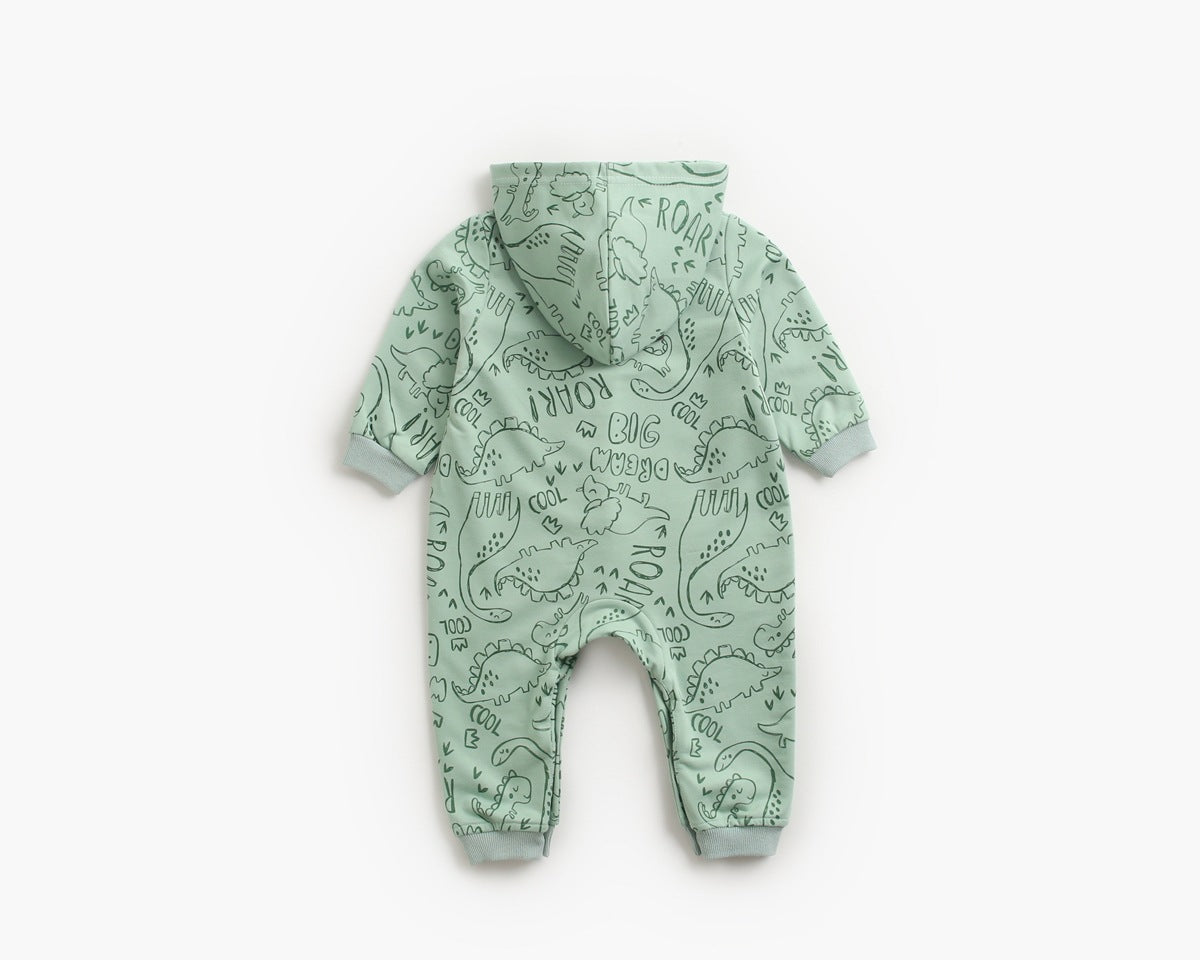 Baby wearing a cartoon dinosaur graphic romper with a matching hat, showcasing vibrant colors and snap button design.