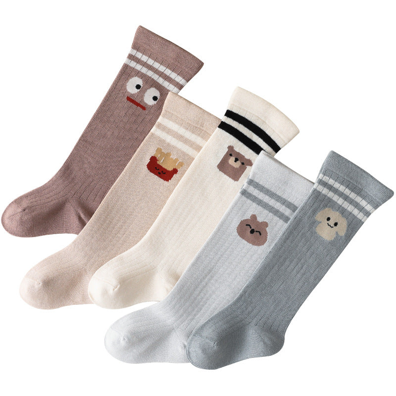 A pair of colorful mid-tube socks for babies featuring a cartoon graphic and striped design, made from soft cotton material.