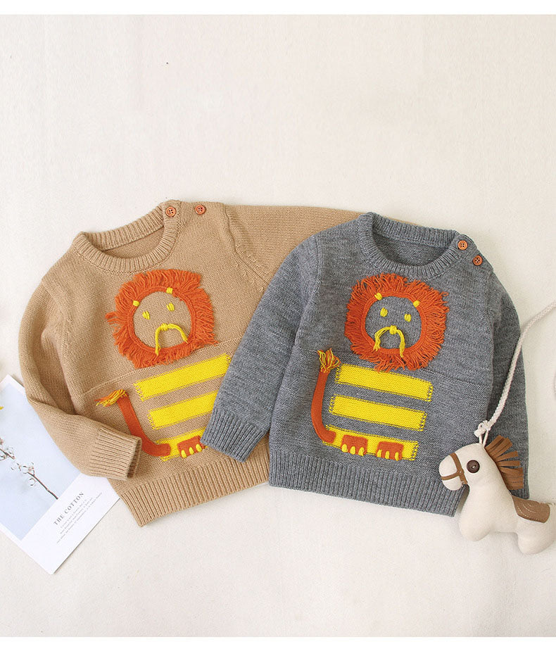 A cozy baby pullover sweater featuring a cute embroidered cartoon lion pattern, available in grey and brown colors, perfect for infants.