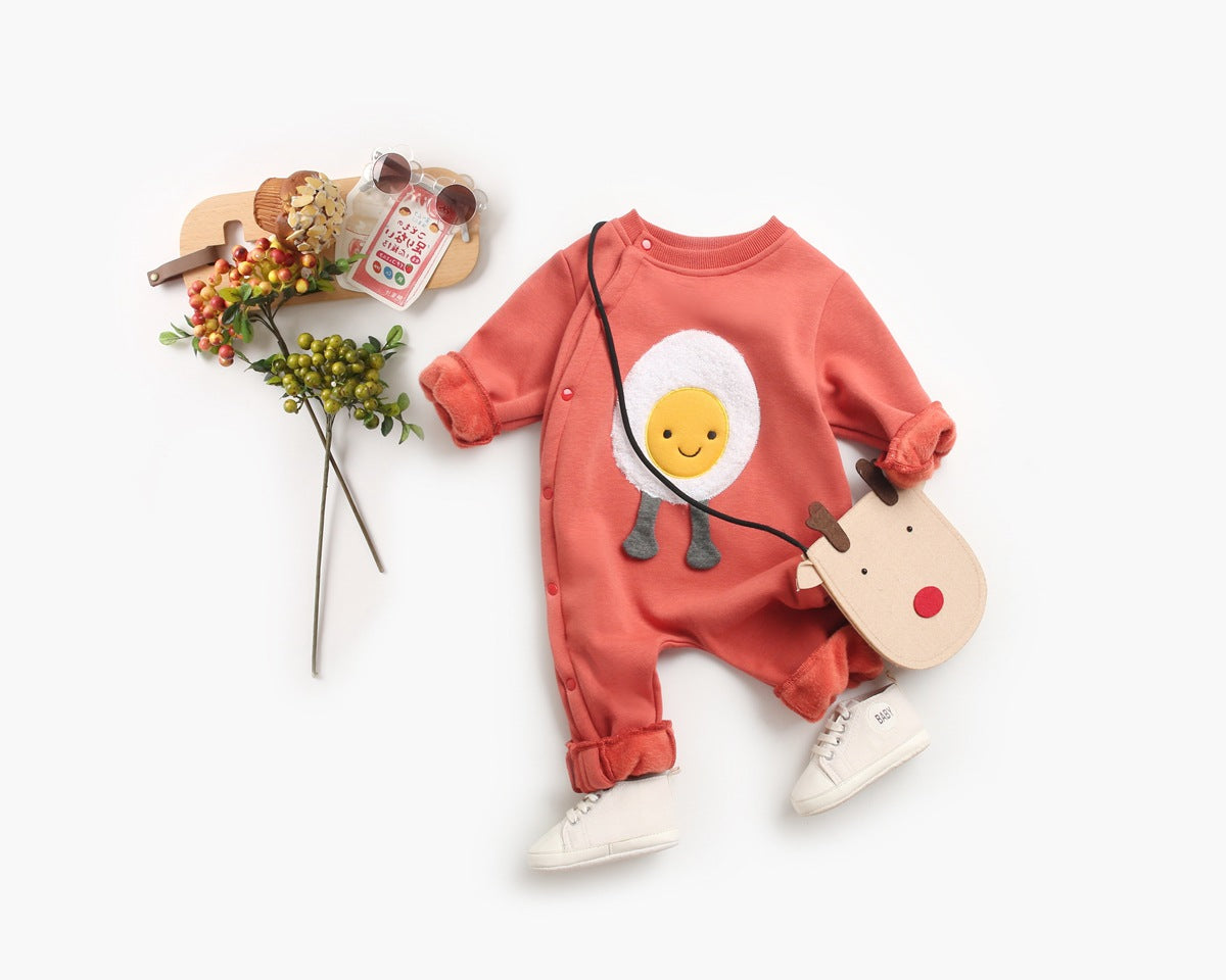 Baby wearing a long sleeved romper with cartoon patterns and side snap buttons, showcasing comfort and style.