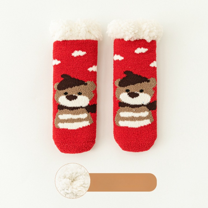 A pair of Baby Cartoon Pattern Thickened Lambswool Coral Fleece Socks in vibrant colors featuring playful cartoon designs, perfect for keeping little feet warm.