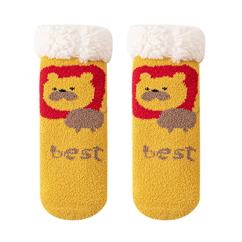 A pair of Baby Cartoon Pattern Thickened Lambswool Coral Fleece Socks in vibrant colors featuring playful cartoon designs, perfect for keeping little feet warm.