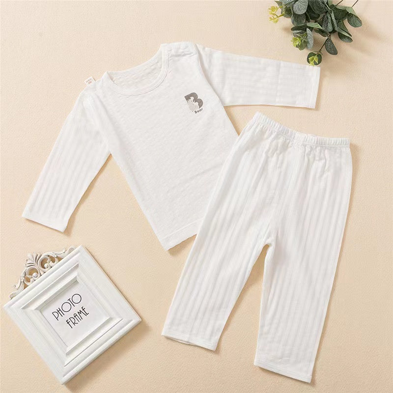 Baby Cartoon Print Long Sleeved Shirt Combo Pants Soft Sets Pajamas in white, pink, and yellow colors, featuring cute cartoon designs.