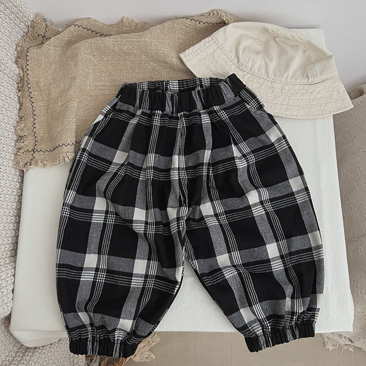 Baby Classic Plaid Pattern Loose Cotton Trousers in black, showcasing a stylish plaid design suitable for both boys and girls.