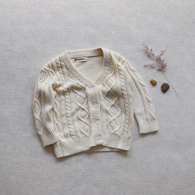 A cozy Baby Crochet Knit Pattern Cardigan in solid beige color with a V-neck and single-breasted design, perfect for infants.