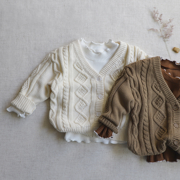 A cozy Baby Crochet Knit Pattern Cardigan in solid beige color with a V-neck and single-breasted design, perfect for infants.