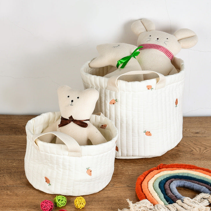 Stylish baby bottle storage basket with embroidered pattern, featuring a convenient handle and available in various colors.