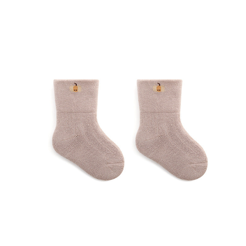 A pair of thickened warm mid tube socks for babies featuring adorable embroidered patterns in various colors.