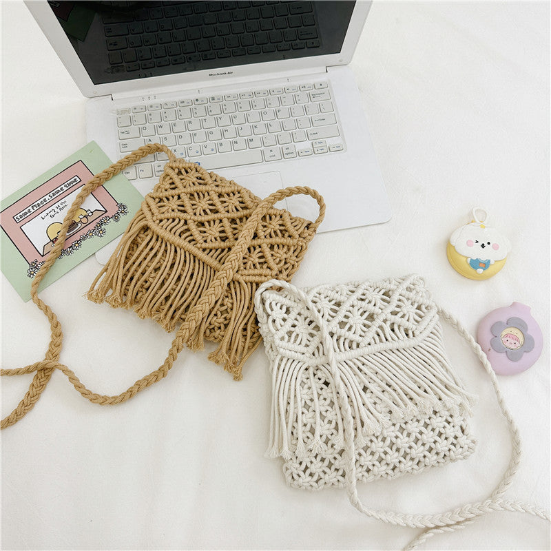 Handmade knitted crossbody bags for baby girls in white and khaki colors, crafted from soft cotton material.