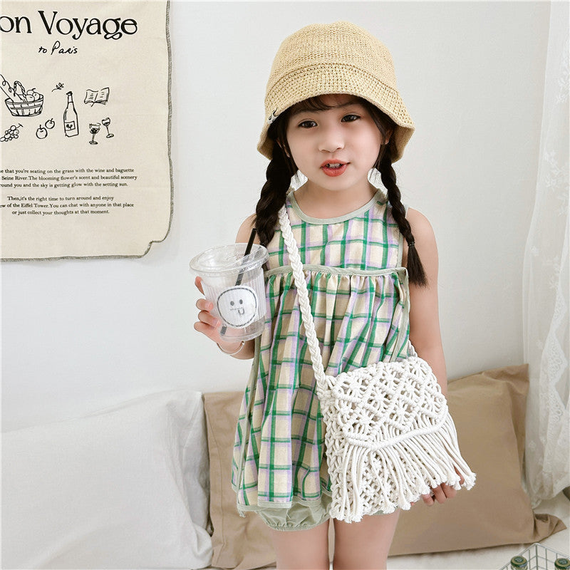 Handmade knitted crossbody bags for baby girls in white and khaki colors, crafted from soft cotton material.