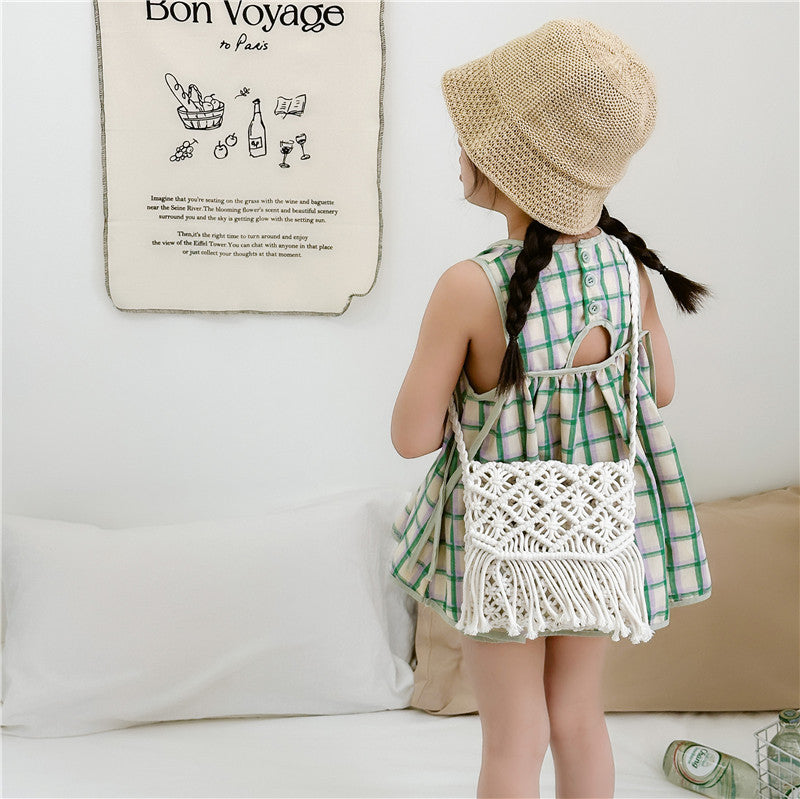 Handmade knitted crossbody bags for baby girls in white and khaki colors, crafted from soft cotton material.