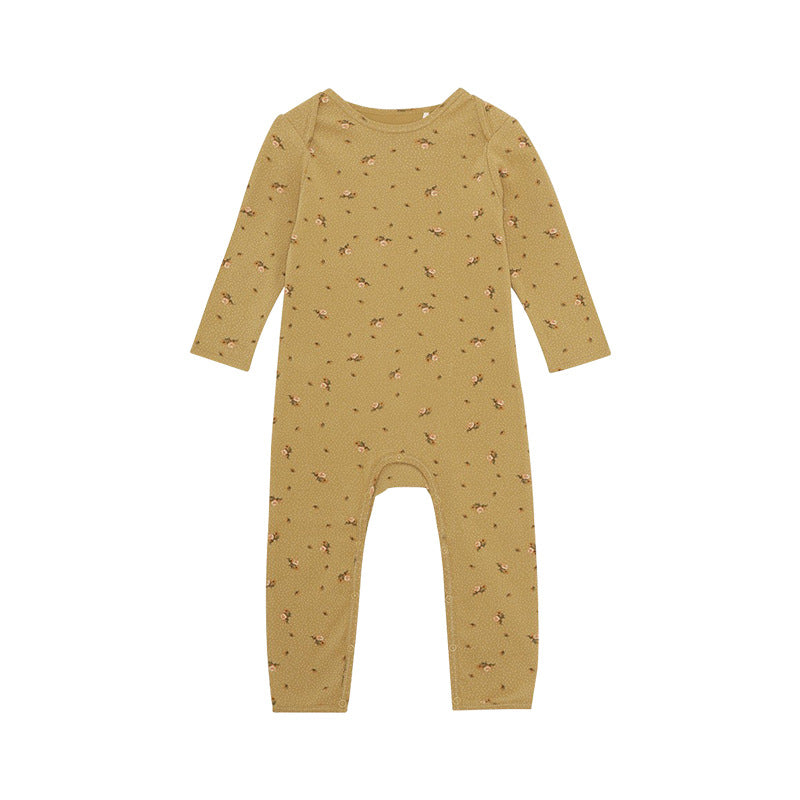 A soft baby jumpsuit featuring a floral and animal print pattern, designed for comfort and style, available in yellow, grey, and apricot.