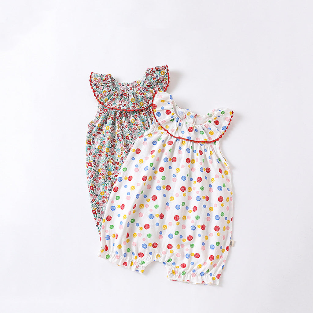 Baby girl wearing a floral pattern ruffle neck sleeveless romper in white and red, perfect for summer outings.