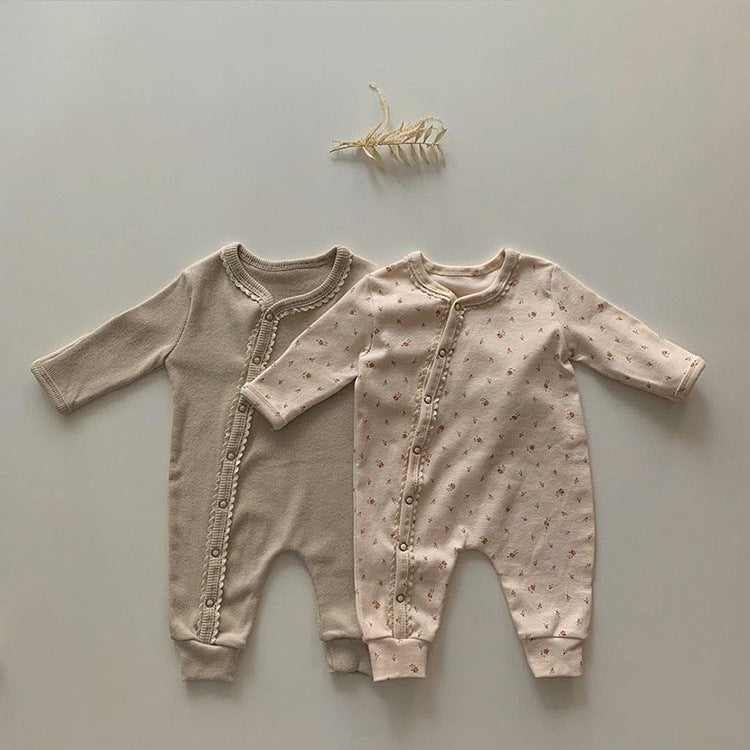 Baby jumpsuit featuring a floral pattern and solid color lace design, button front for easy dressing, available in khaki and apricot.