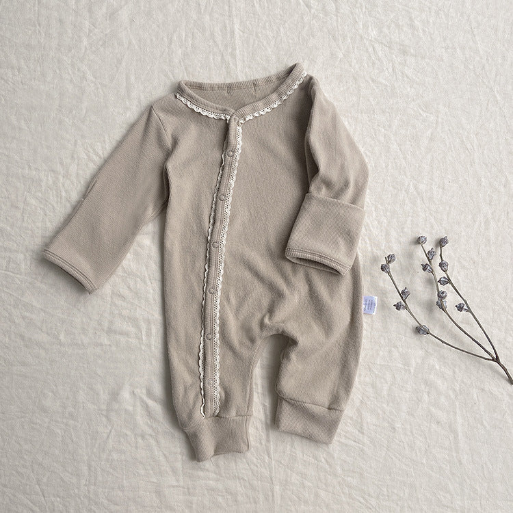 Baby jumpsuit featuring a floral pattern and solid color lace design, button front for easy dressing, available in khaki and apricot.