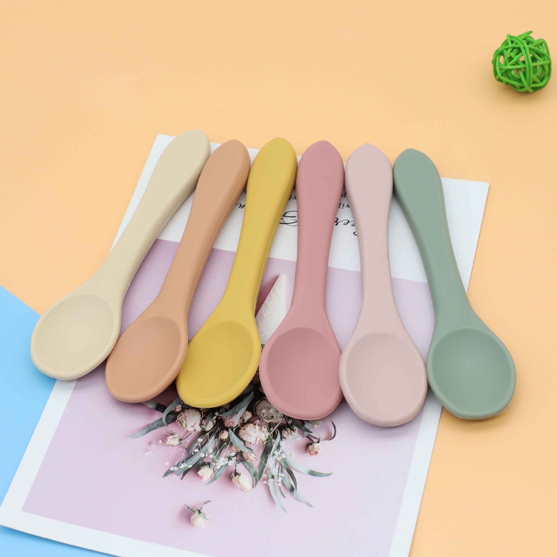 Baby Food Grade Silicone Spoon Fork Set in various colors, designed for safe self-feeding.