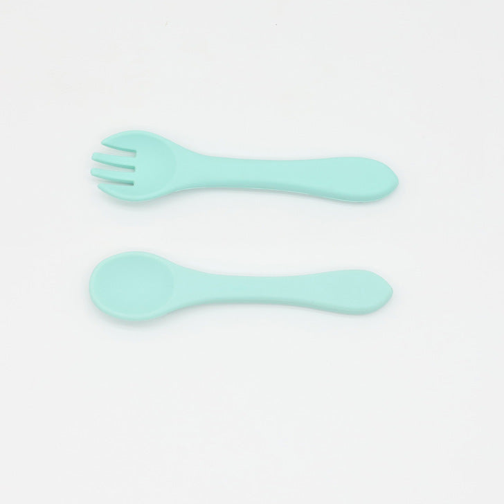 Baby Food Grade Silicone Spoon Fork Set in various colors, designed for safe self-feeding.