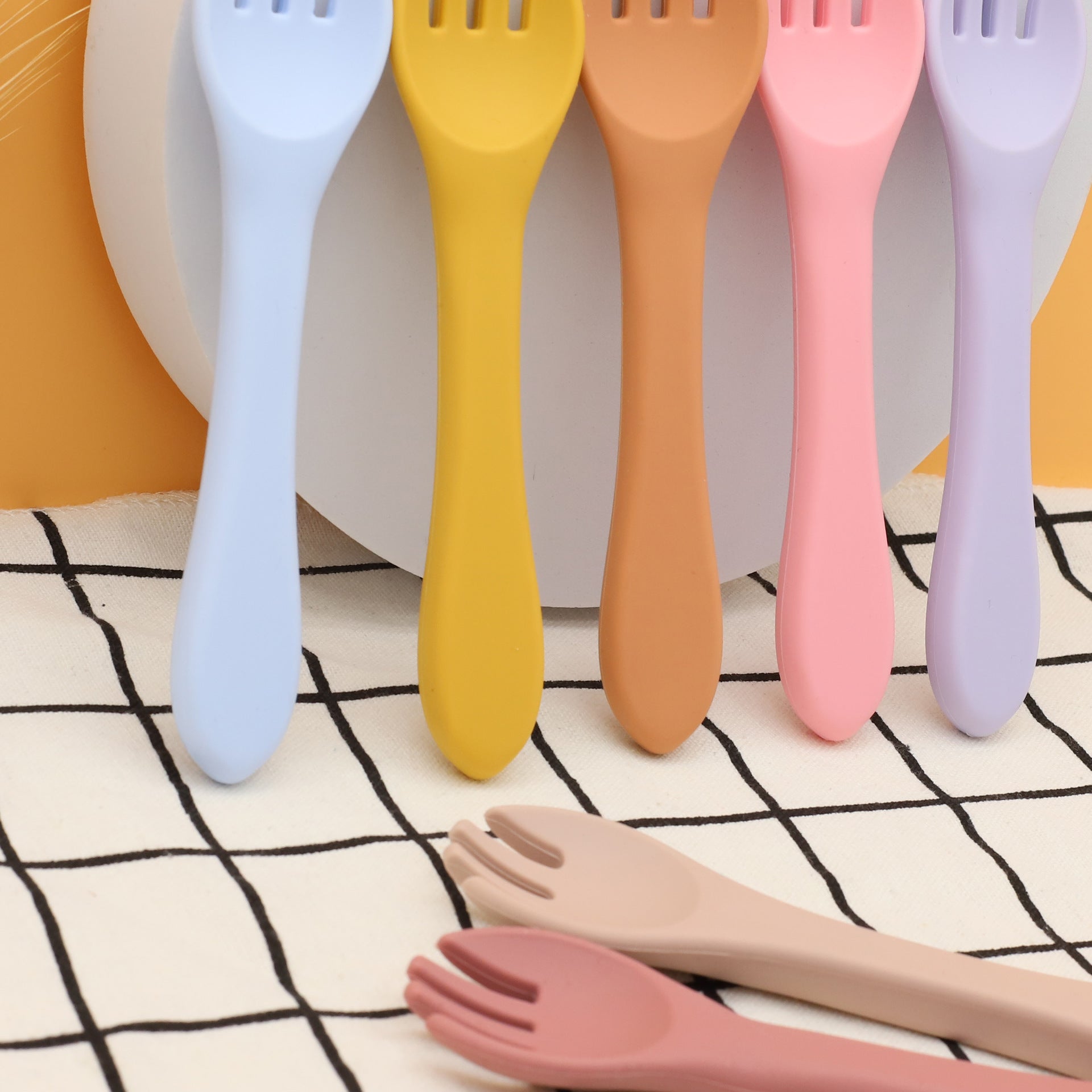 Baby Food Grade Silicone Spoon Fork Set in various colors, designed for safe self-feeding.