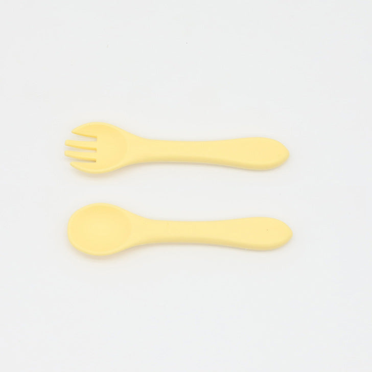 Baby Food Grade Silicone Spoon Fork Set in various colors, designed for safe self-feeding.