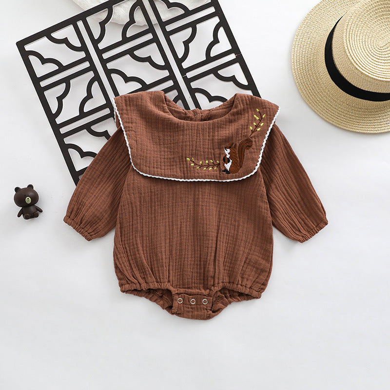 Baby girl onesie featuring animal embroidery and lapel design in beige and coffee colors.