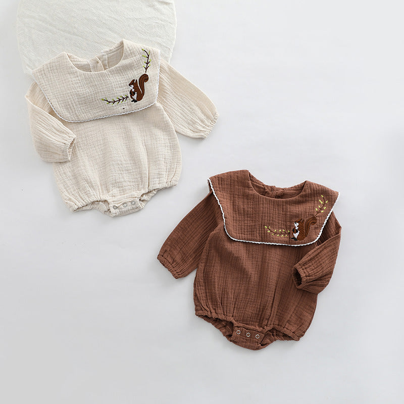 Baby girl onesie featuring animal embroidery and lapel design in beige and coffee colors.