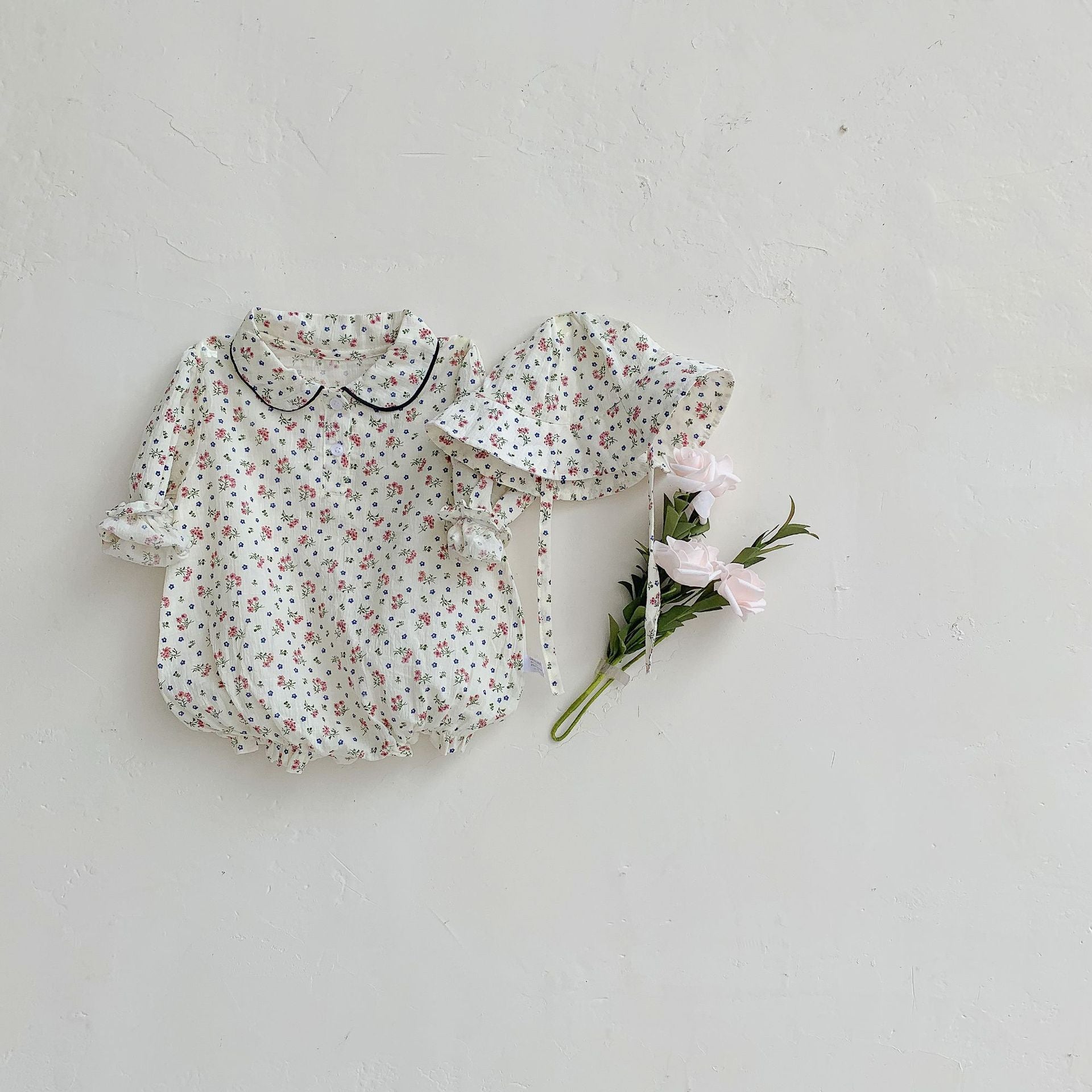 Baby Girl Ditsy Flower & Cherry Pattern Doll Neck Long Sleeves Bodysuit in pink and apricot colors, showcasing floral and fruit designs.