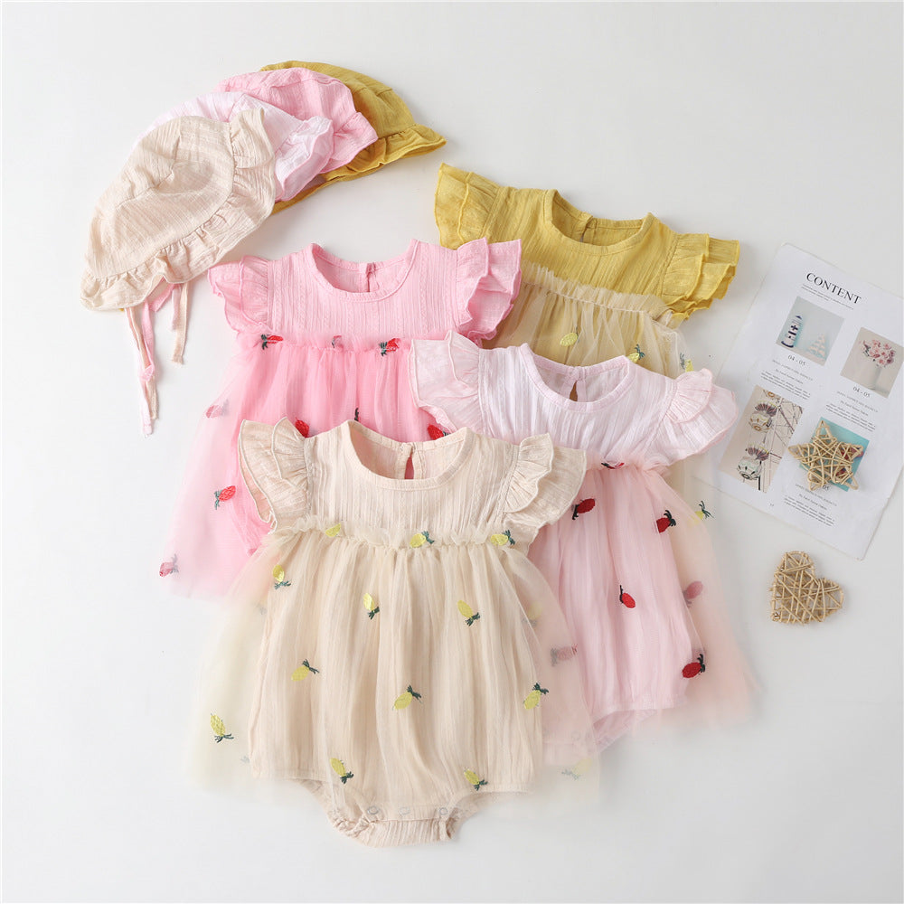 Baby girl dress featuring pineapple embroidery and mesh overlay, perfect for summer occasions.