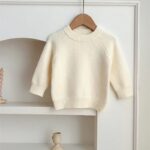 Baby Girl Solid Knitting Sweater in Pink, Beige, Apricot, and Coffee colors, featuring a round collar design.