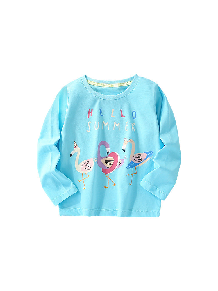 Baby girl wearing a colorful cartoon pattern crewneck shirt, showcasing vibrant colors and playful designs.